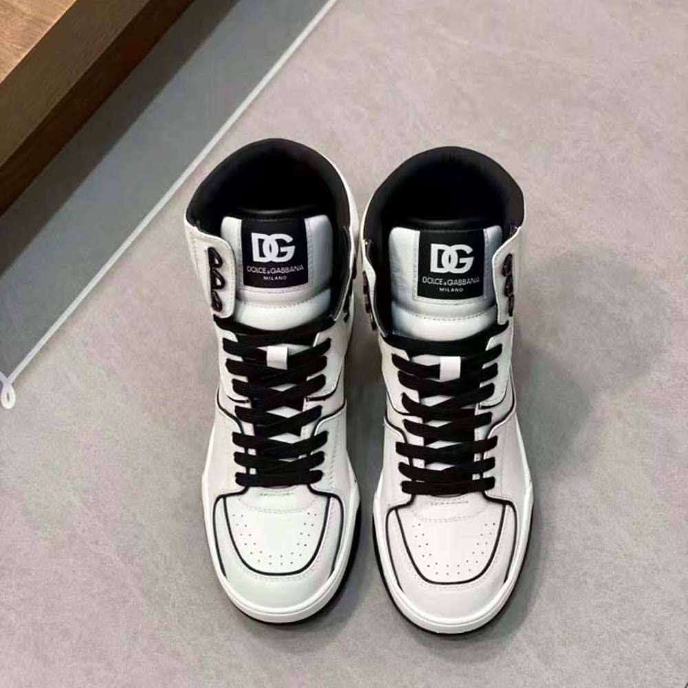 Close-up of black calfskin leather and D&G branding on sneakers