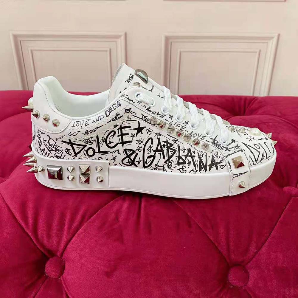 Close-up on silver studs detail of Dolce Gabbana D&G Unisex White Portofino Sneakers