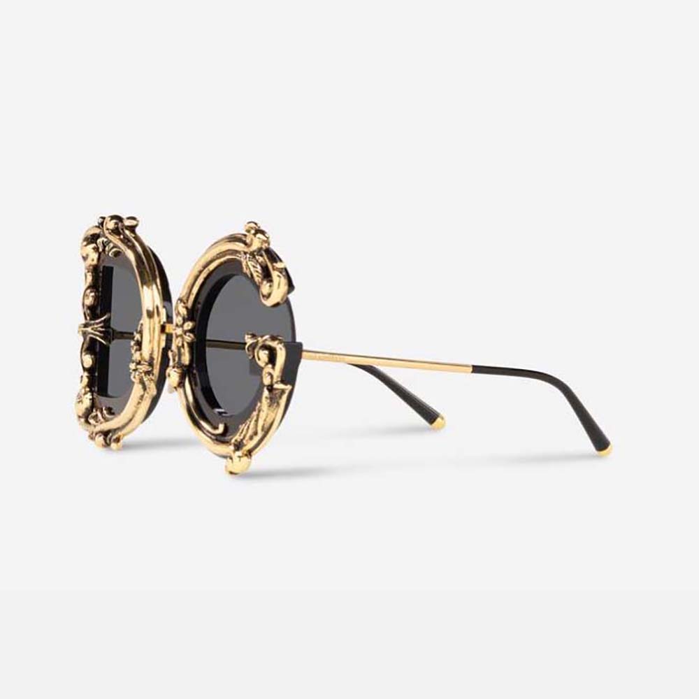 Close-up detail of gold baroque temples on Dolce Gabbana D&G Women DG Baroque Sunglasses-Gold