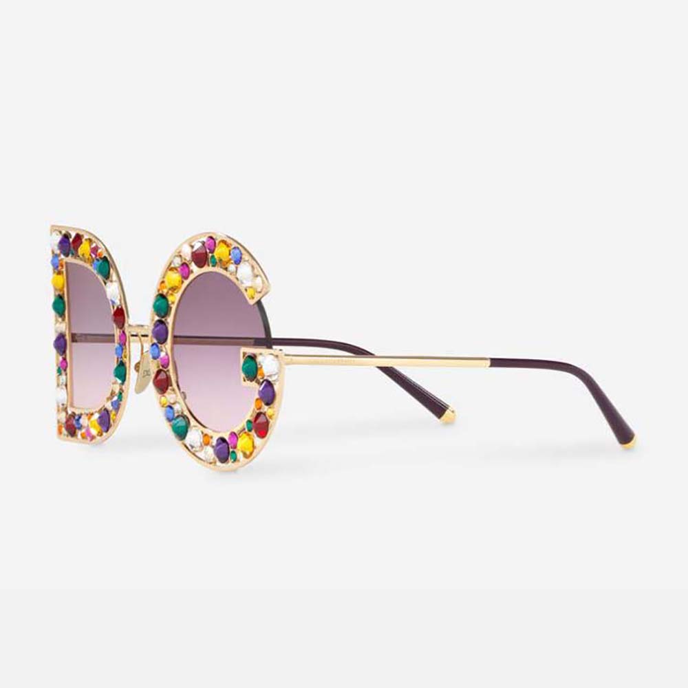 Close-up on crystal D&G logo hardware on pink sunglasses temple
