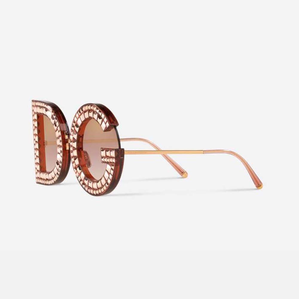 Side angle showing gold D&G logo on temples of pink glitter sunglasses