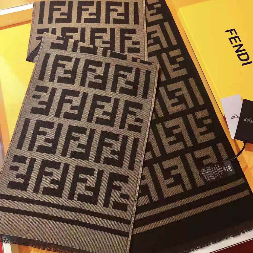 Side angle of Fendi Women Black Wool and Silk Scarf draped over shoulders