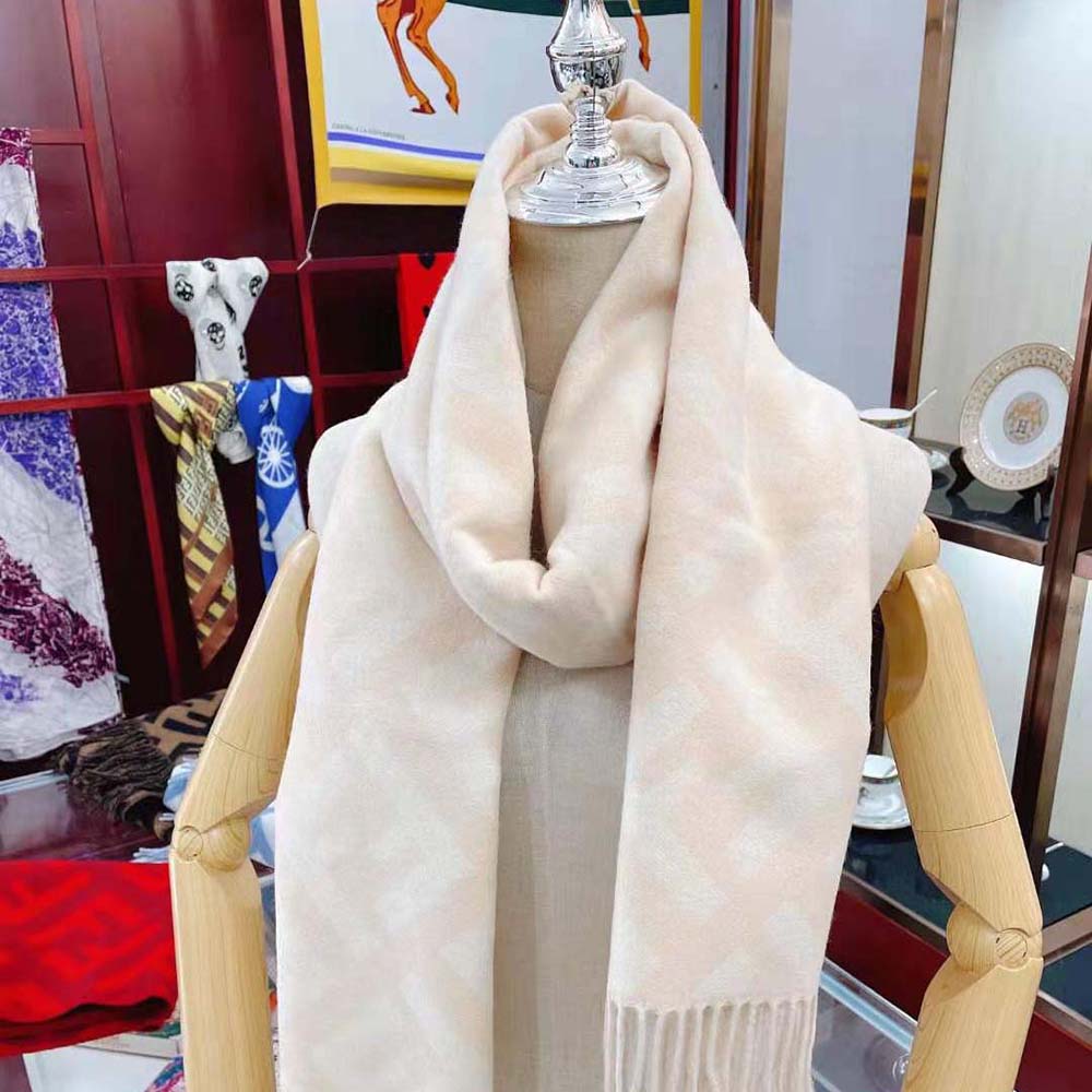 Detail showing embossed FF logo on Fendi Women FF Scarf Pale Pink Cashmere Scarf