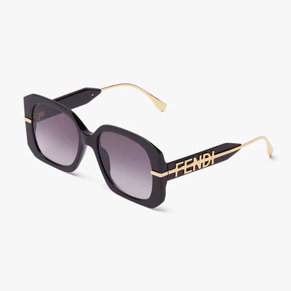 Side angle showing gold-toned hardware on Fendi Women Fendigraphy Sunglasses