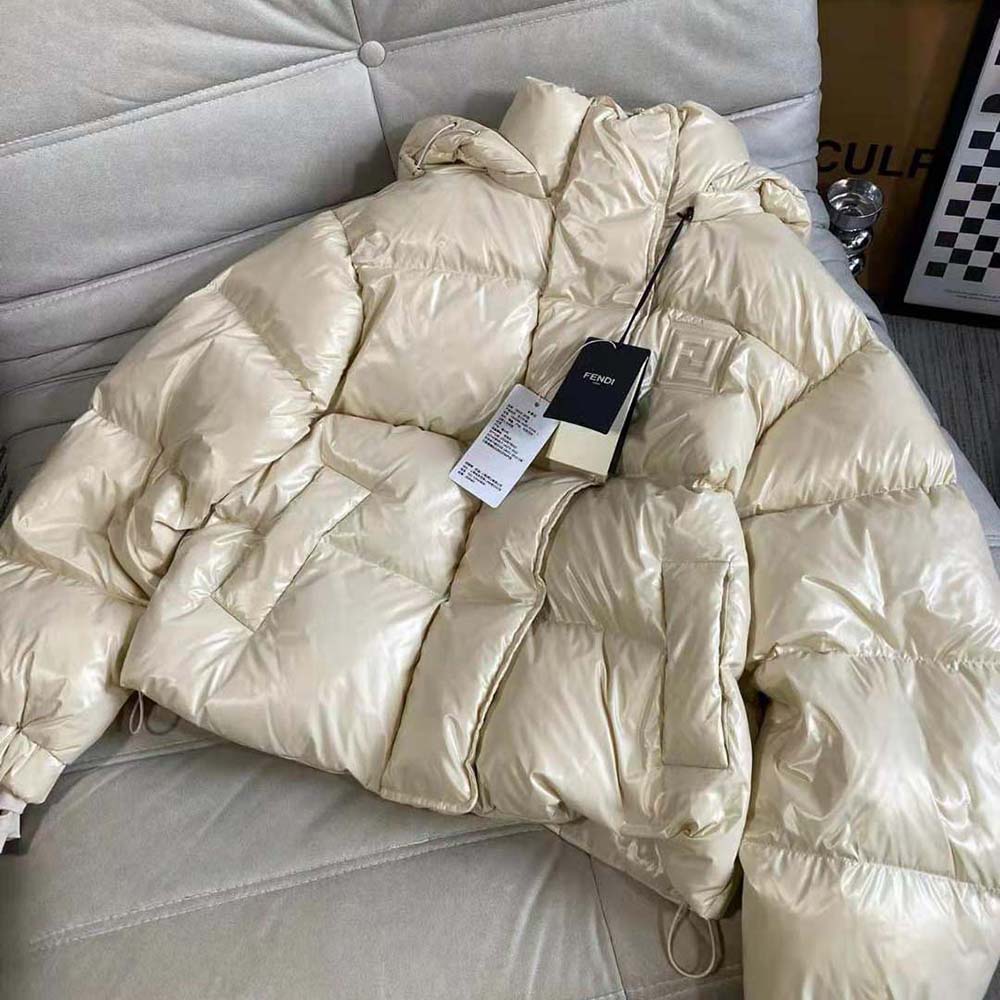 Close-up of gold-tone hardware on Fendi Women Pearl Nylon Down Jacket