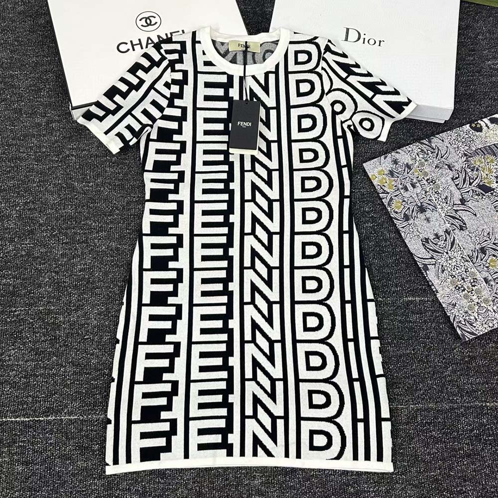 Close-up detail of Fendi Roma logo on knit dress
