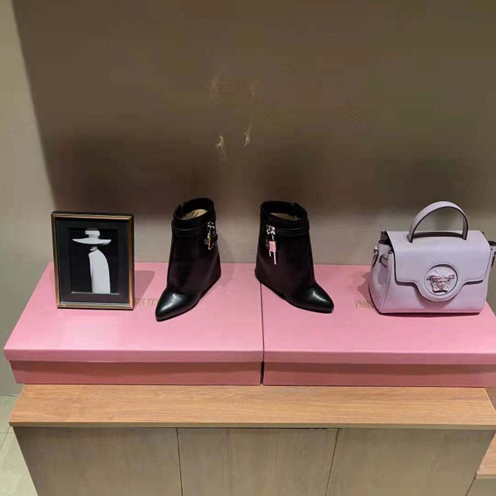 Top angle showing zip closure on Givenchy Women Shark Lock Ankle Boots