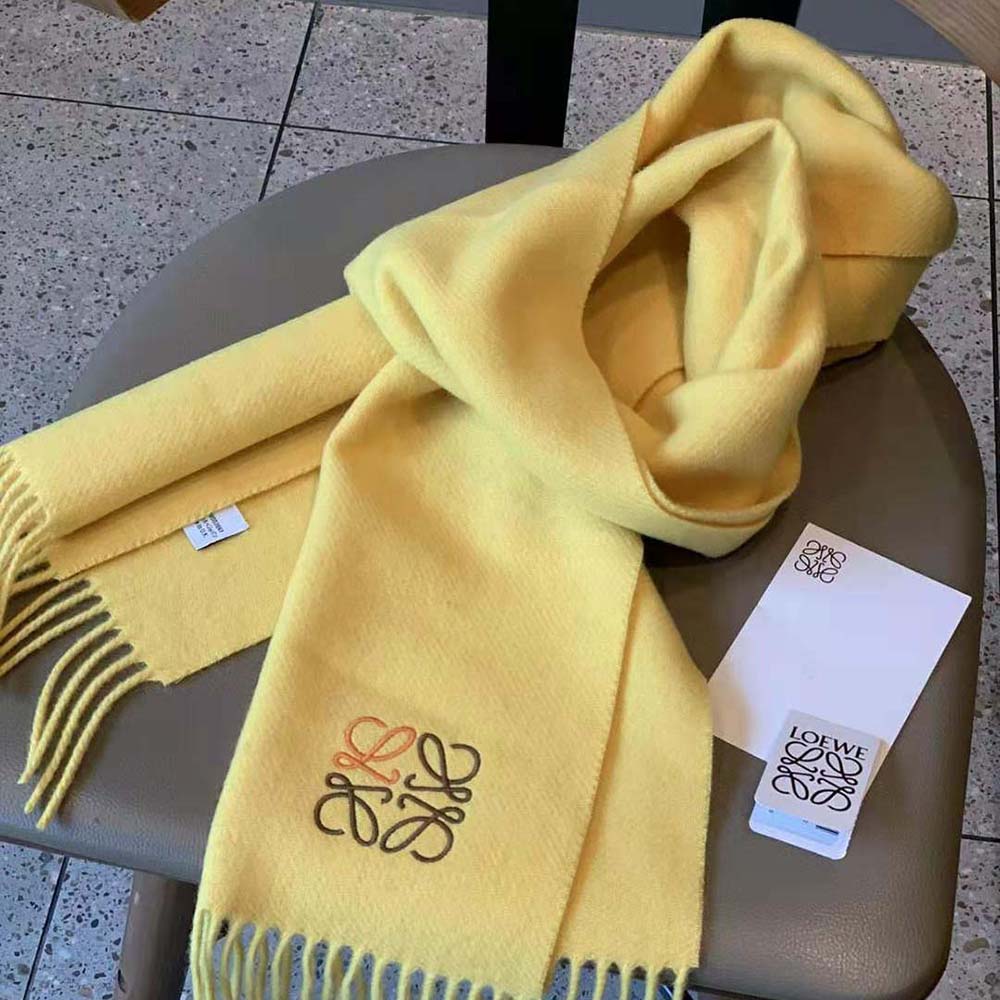 Draped Loewe Women Anagram Scarf in Cashmere-Yellow showing soft texture