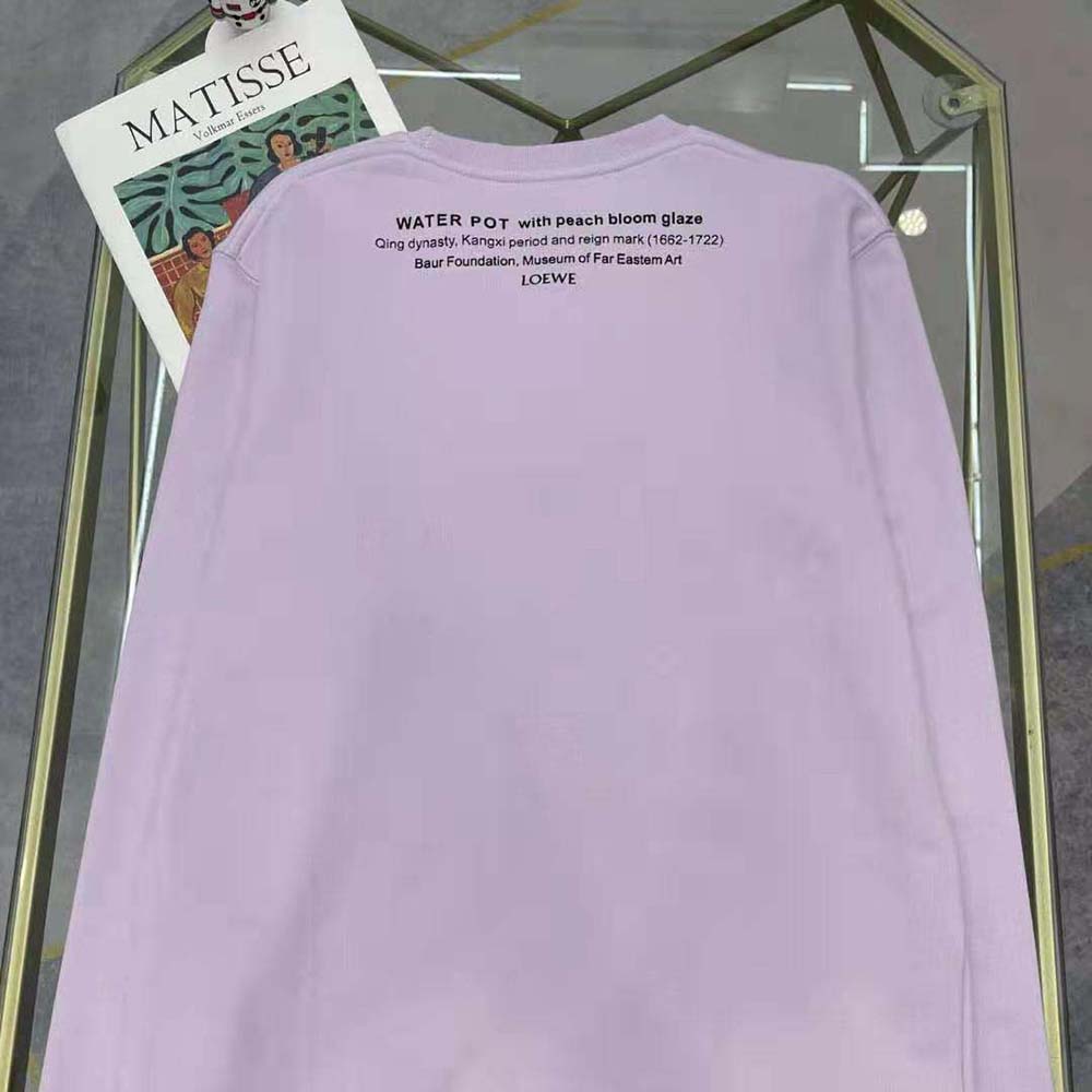 Side angle showing ribbed cuff on Loewe Women Ceramic Print Sweatshirt
