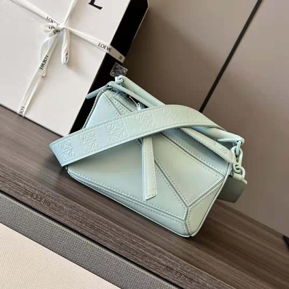 Close-up of silver hardware and Puzzle stitching on Loewe Mini Puzzle Bag