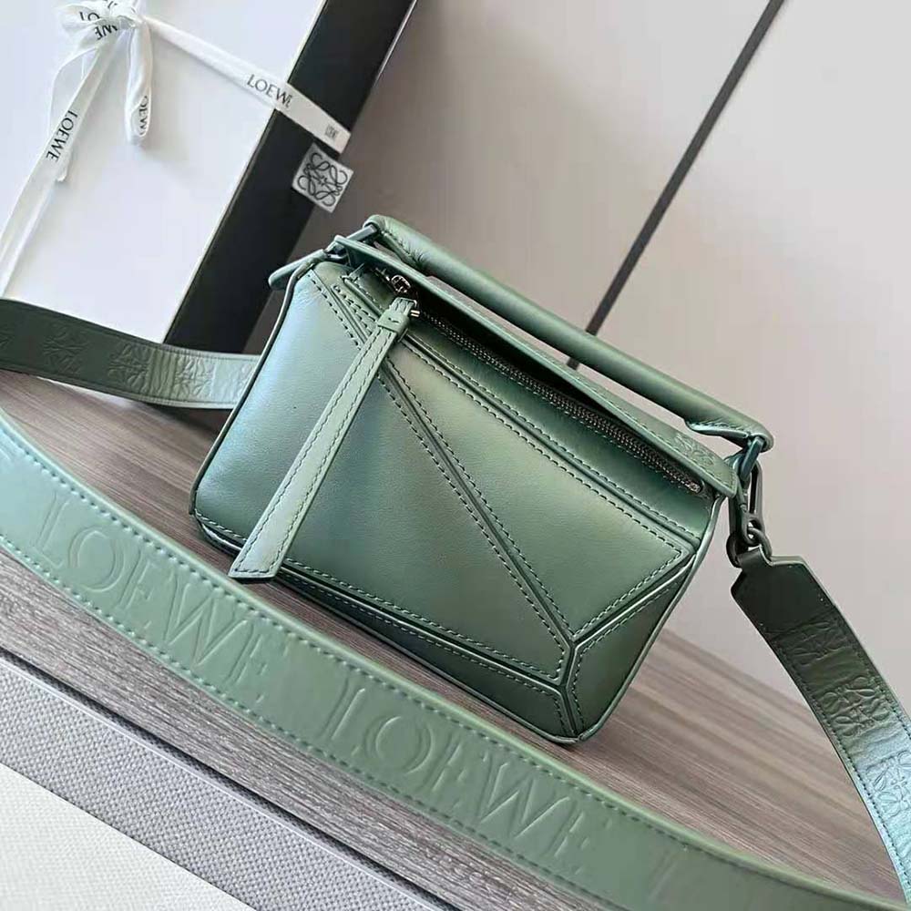 Close-up detail of Loewe Women Mini Puzzle Bag silver hardware