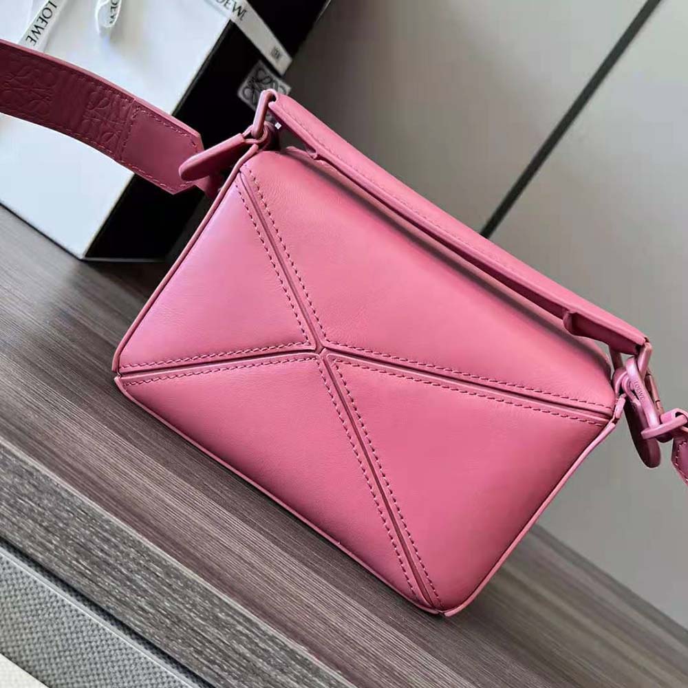 Side angle showing Loewe Women Mini Puzzle Bag’s geometric silhouette