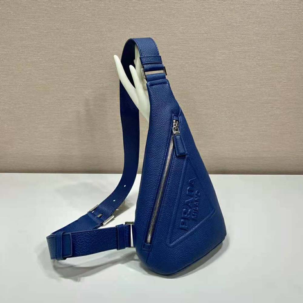 Interior shot showing navy Re-Nylon logo-print lining in Prada Men Cross Leather Bag
