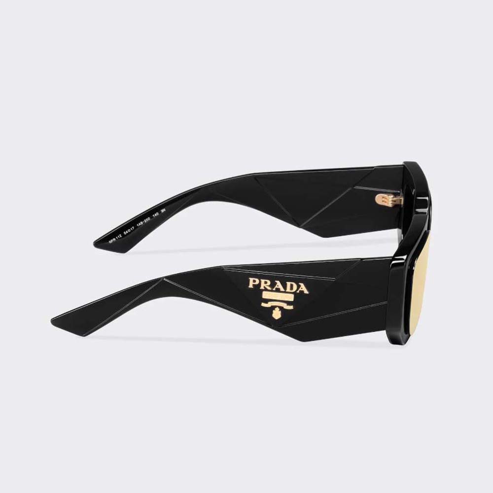 Side profile showing oversized silhouette of Prada Women Symbole Sunglasses
