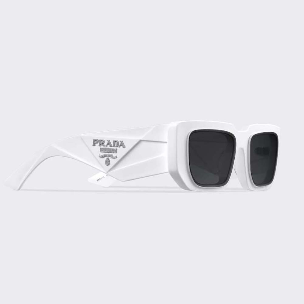 Close-up of the white acetate frame and Prada triangle logo detail
