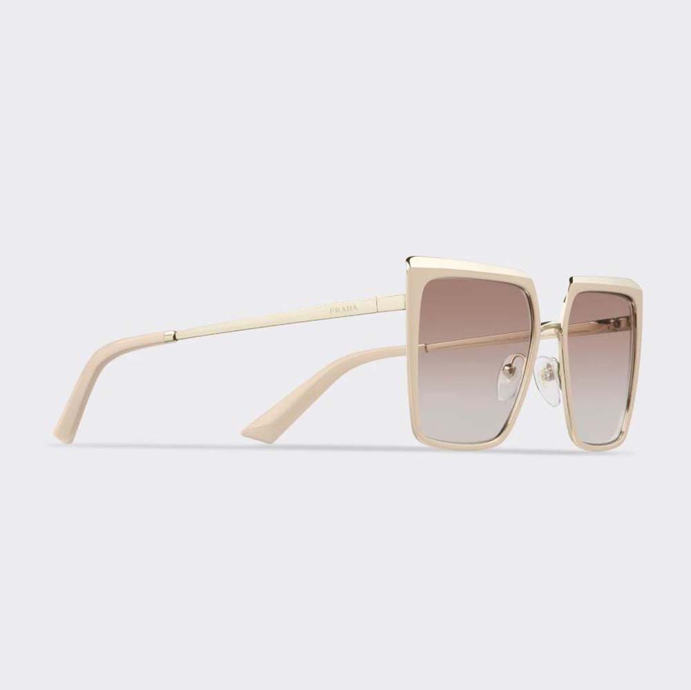 Close-up of signature Prada logo on pink frame temple
