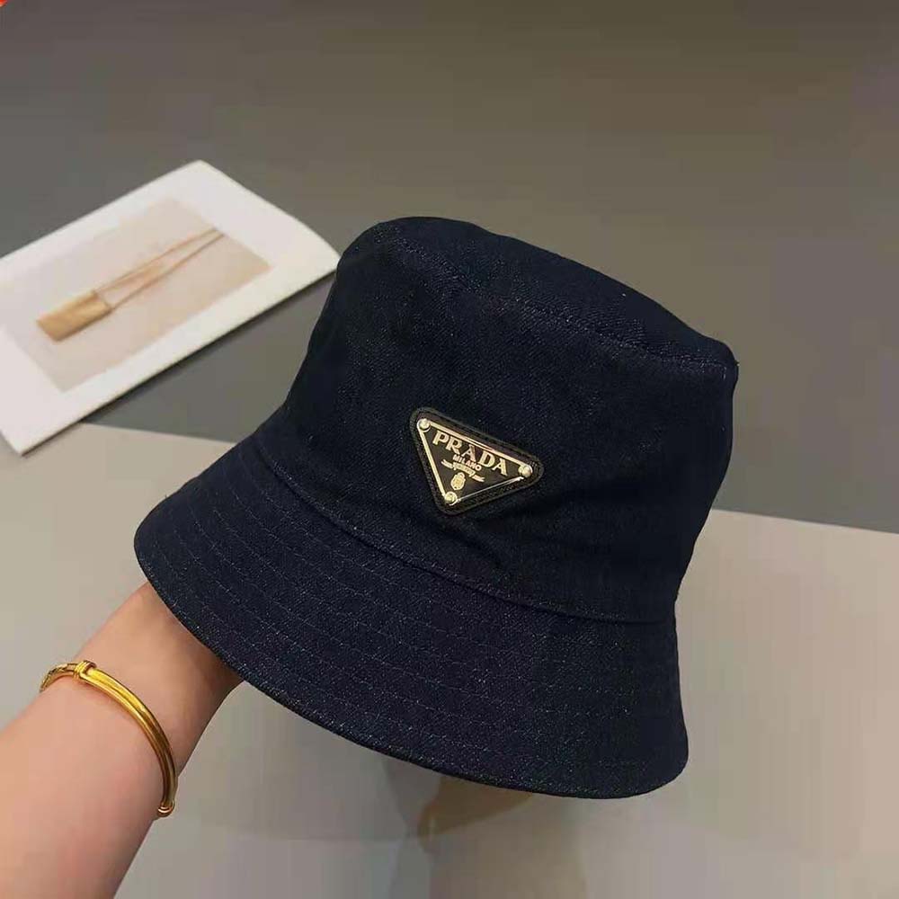 Side angle showing denim texture on Prada Women Denim Bucket Hat-Navy
