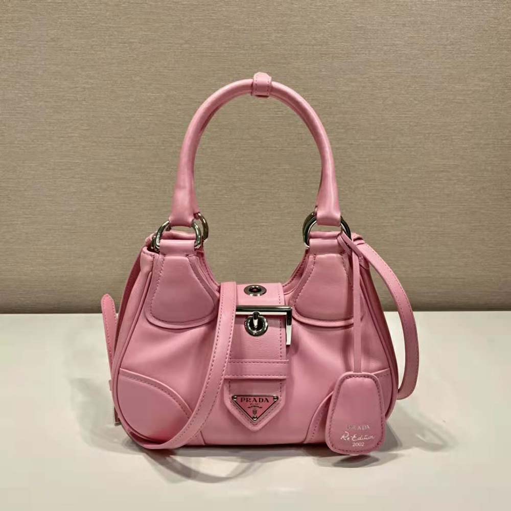 Close-up on pink leather and silver hardware details of Prada bag