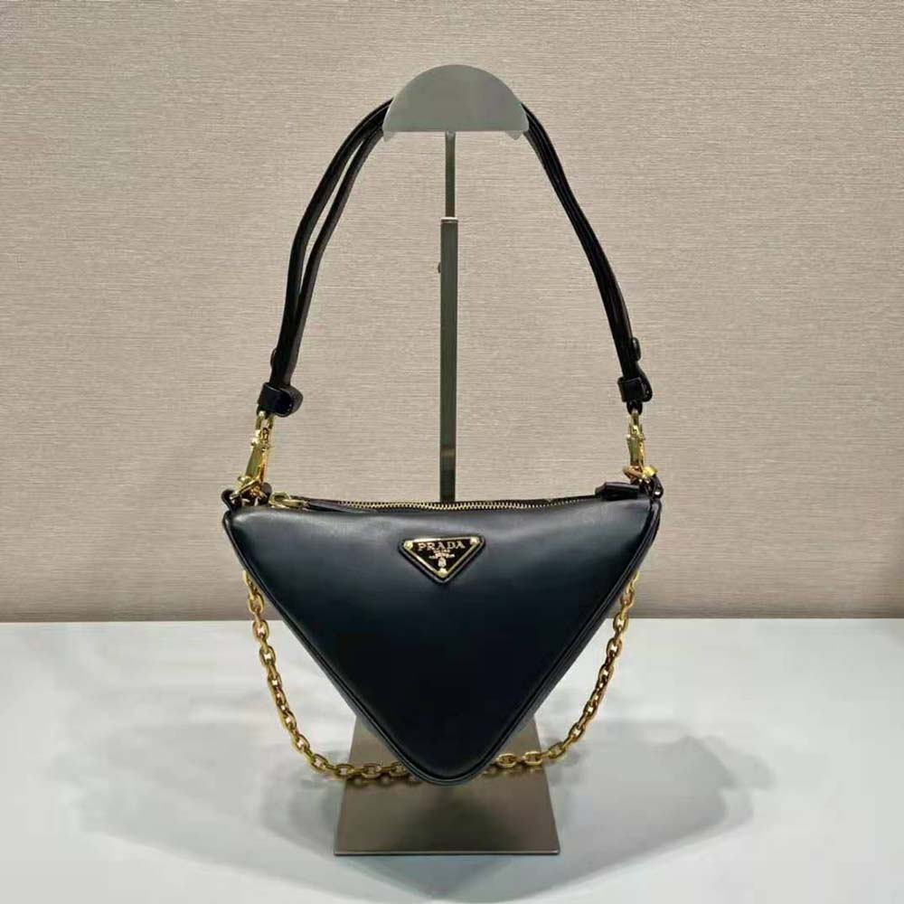 Side profile showing silhouette of Prada Women Symbole Leather and Fabric Mini Bag-Green