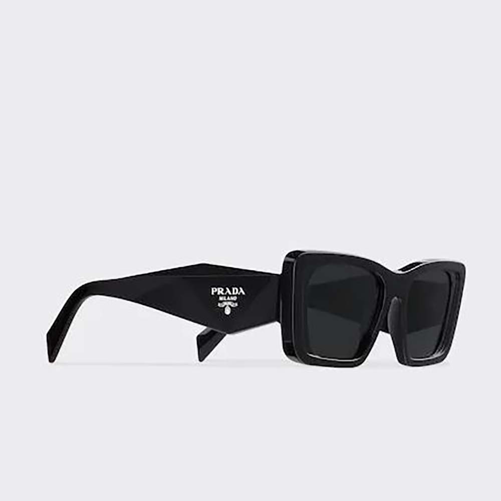 Close-up of Prada triangle logo on Prada Women Symbole Sunglasses temple