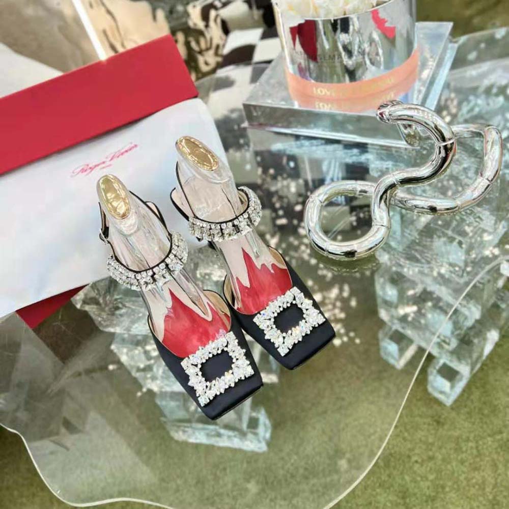 Close-up of the sparkling rhinestone buckle on Roger Vivier slingback pumps
