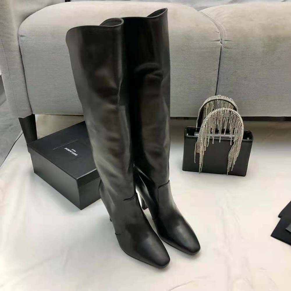 Close-up of YSL gold hardware on Harper Boots smooth leather