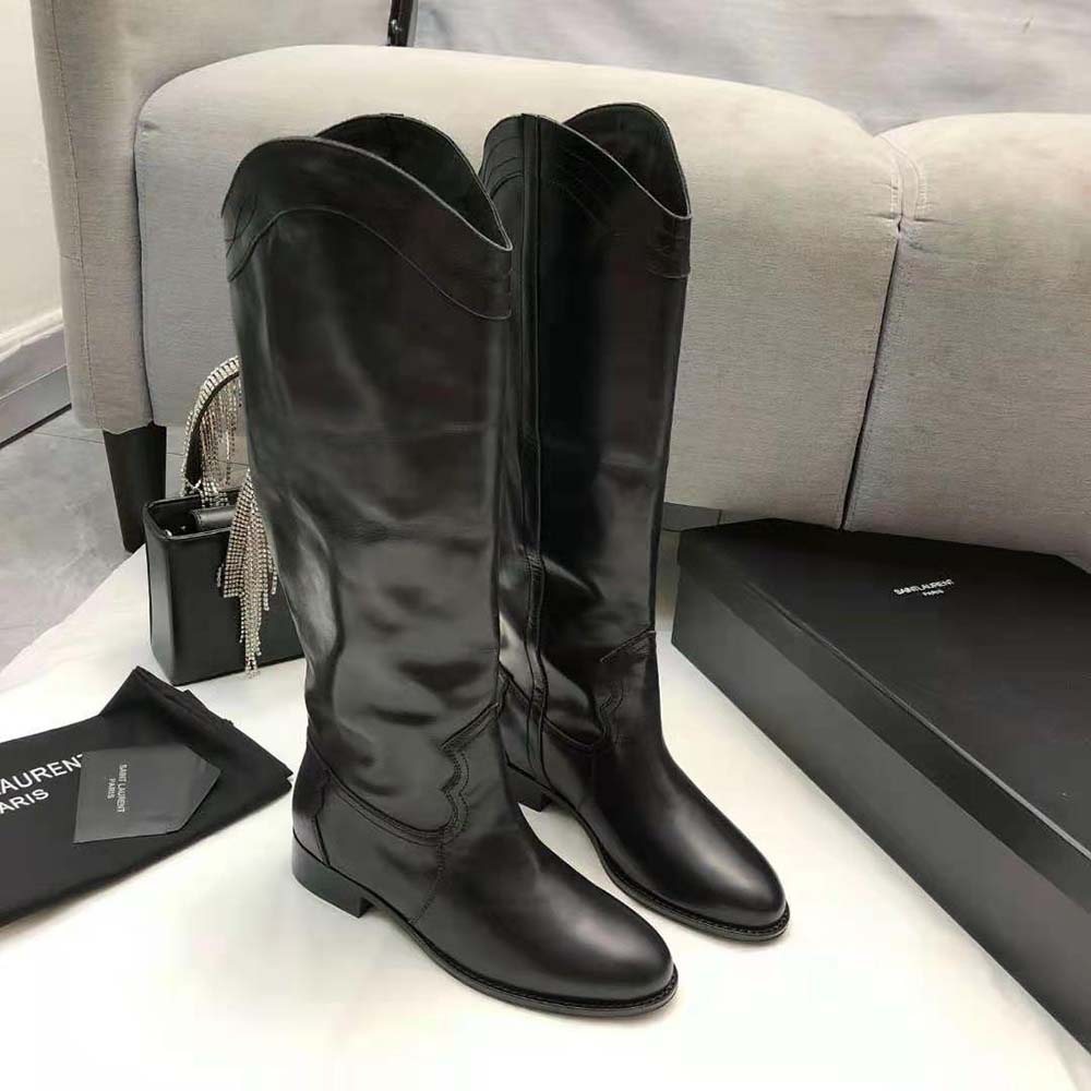 Side profile showing zipper and silhouette of Saint Laurent YSL Kate Boots