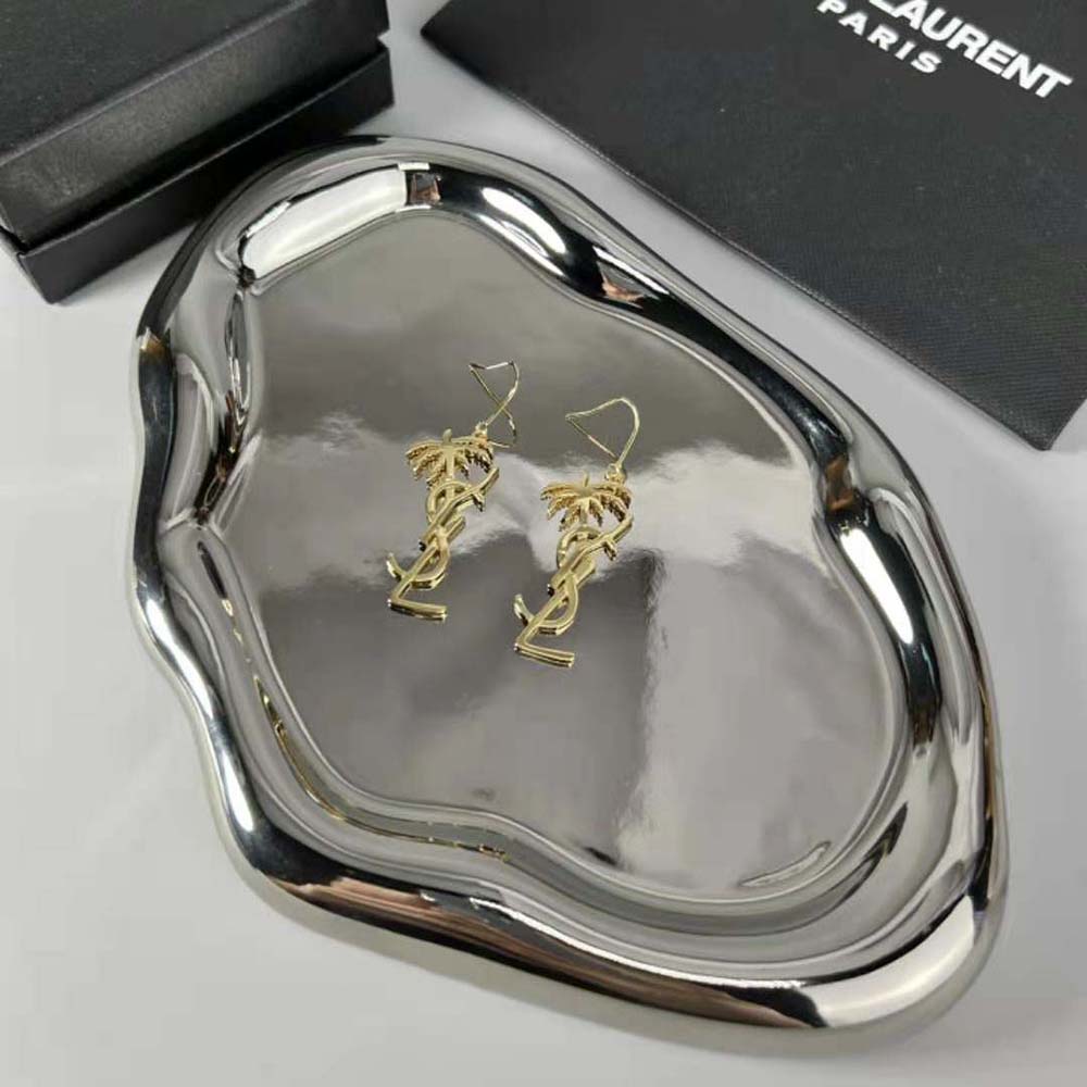 Side angle showing post closure of Saint Laurent YSL Palm Earrings in gold