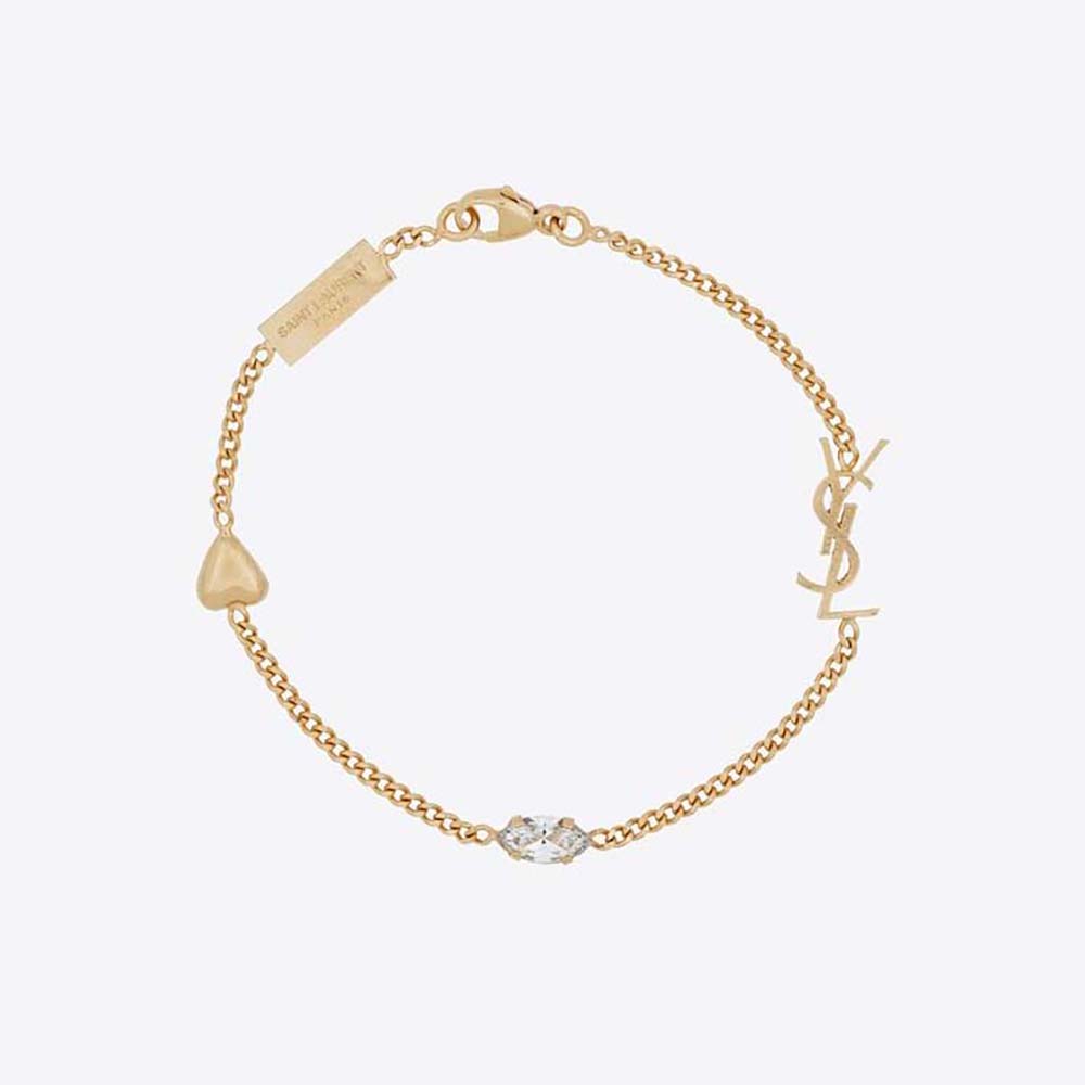 Close-up of Saint Laurent YSL Women Opyum Heart Charm Bracelet gold finish