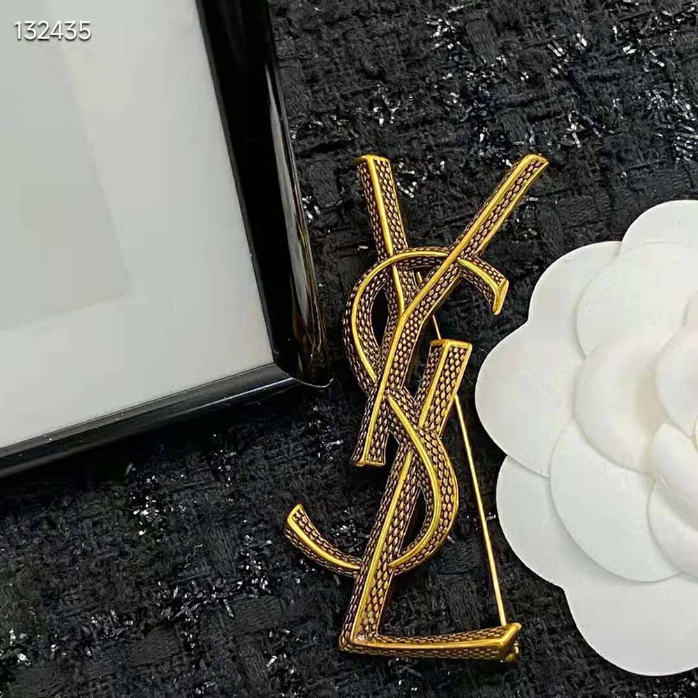 Side angle of Saint Laurent YSL Women Opyum Ysl Snake Brooch secured with pin closure