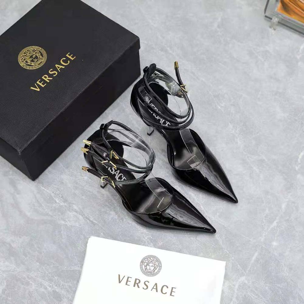 Close-up of gold Medusa emblem on Versace Women Pin-Point Pumps