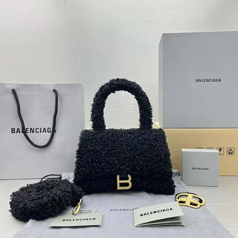 Close-up of brushed silver hardware on Balenciaga furry hourglass handbag