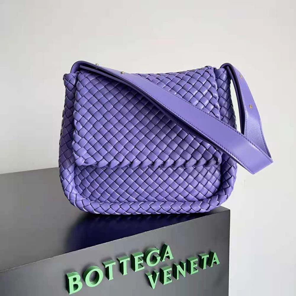 Close-up of purple padded intreccio leather weave on Bottega Veneta shoulder bag