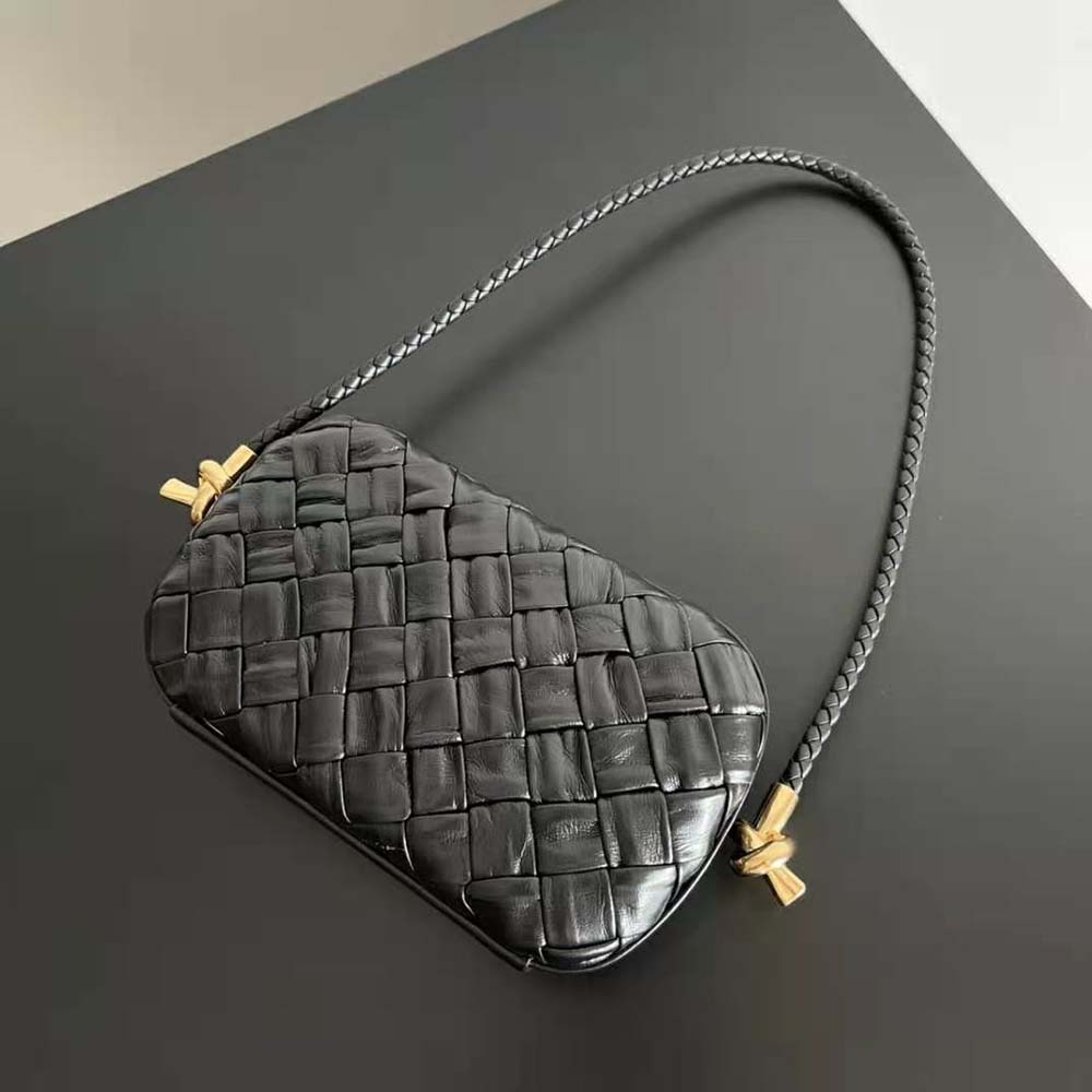 Side angle of Bottega Veneta Women Knot Minaudiere On Strap-Black with leather strap