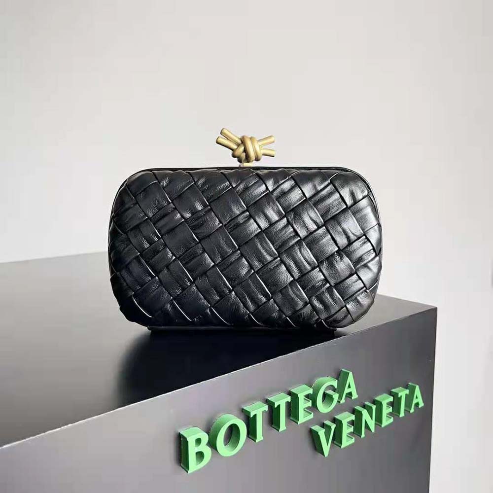 Close-up of gold-tone hardware and knot closure on Bottega Veneta Women Knot Minaudiere