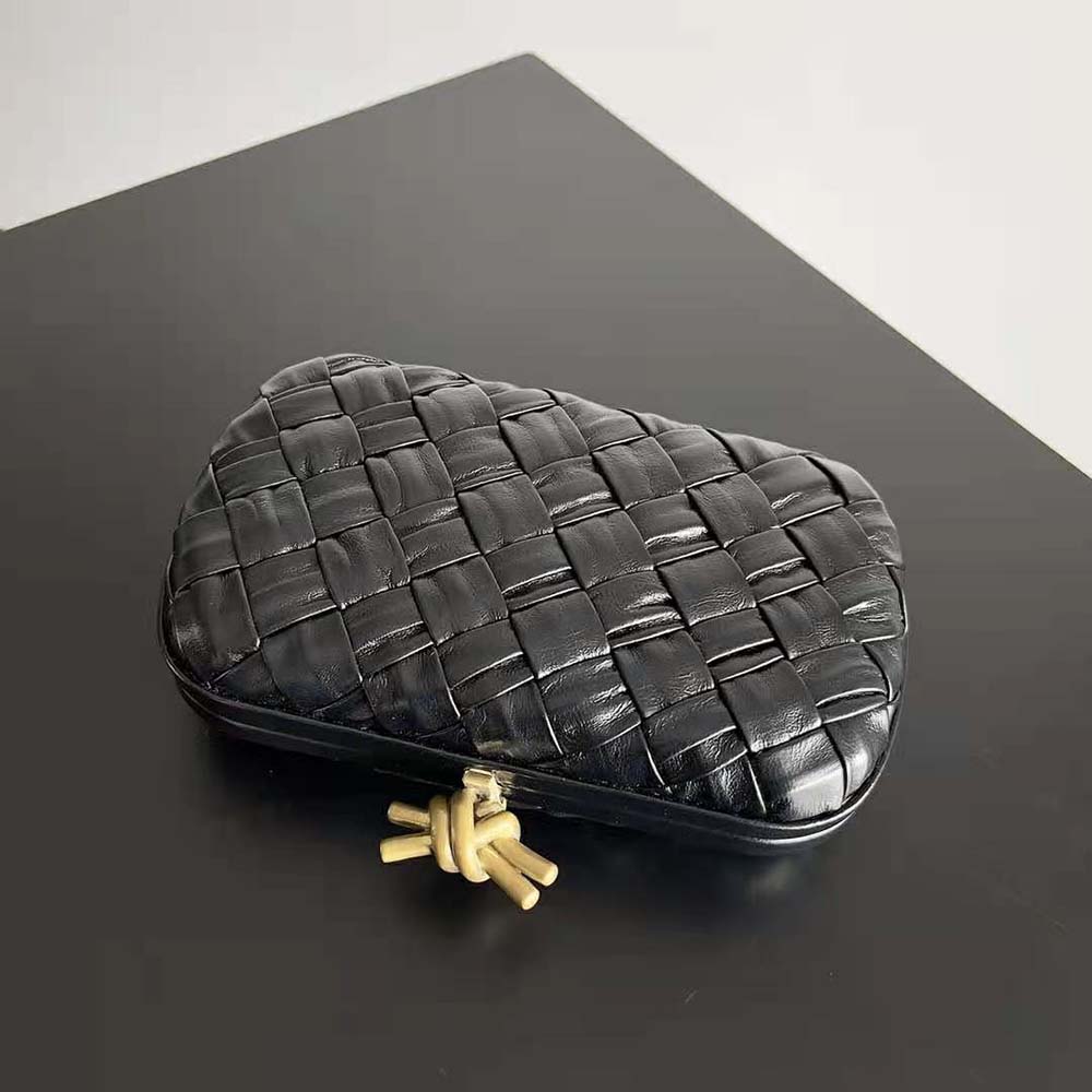 Side angle showing padded intreccio leather texture on Bottega Veneta Women Knot Minaudiere
