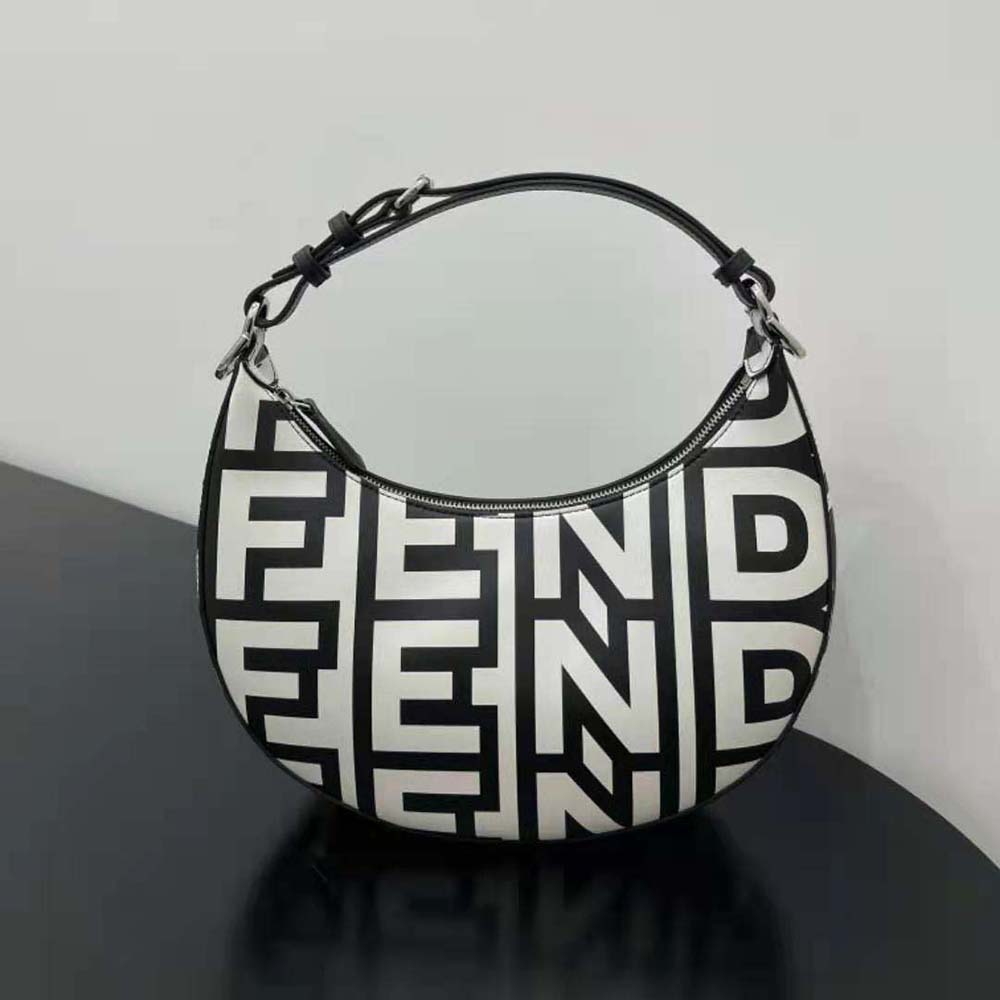 Close-up detail of printed leather and gold hardware on Fendi Roma Capsule Bag