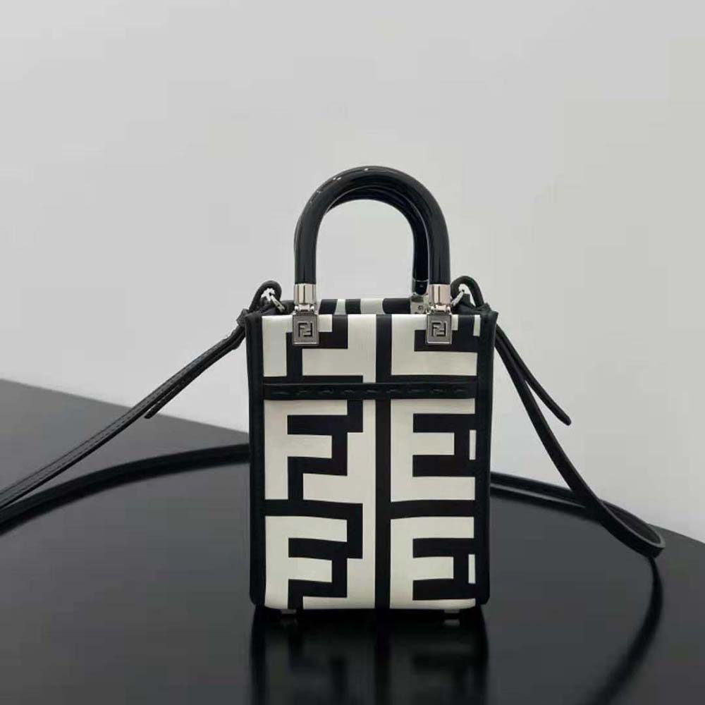 Close-up of gold-tone hardware on Fendi Women Mini Sunshine Shopper bag