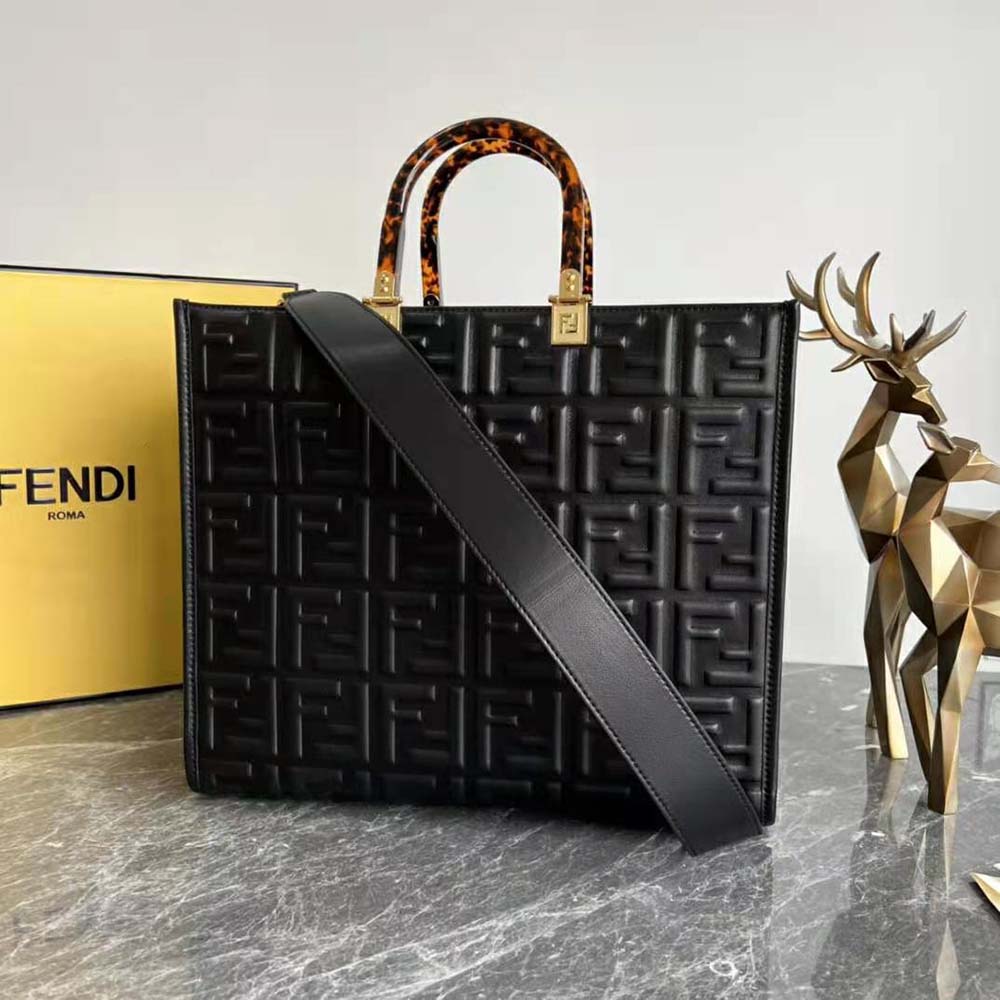 Side angle showing silhouette of Fendi Women Sunshine Medium Black Leather Shopper