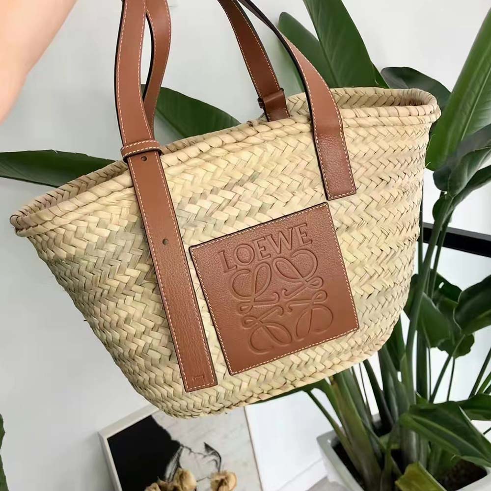 Side angle showing spacious interior of Loewe Women Large Basket Bag