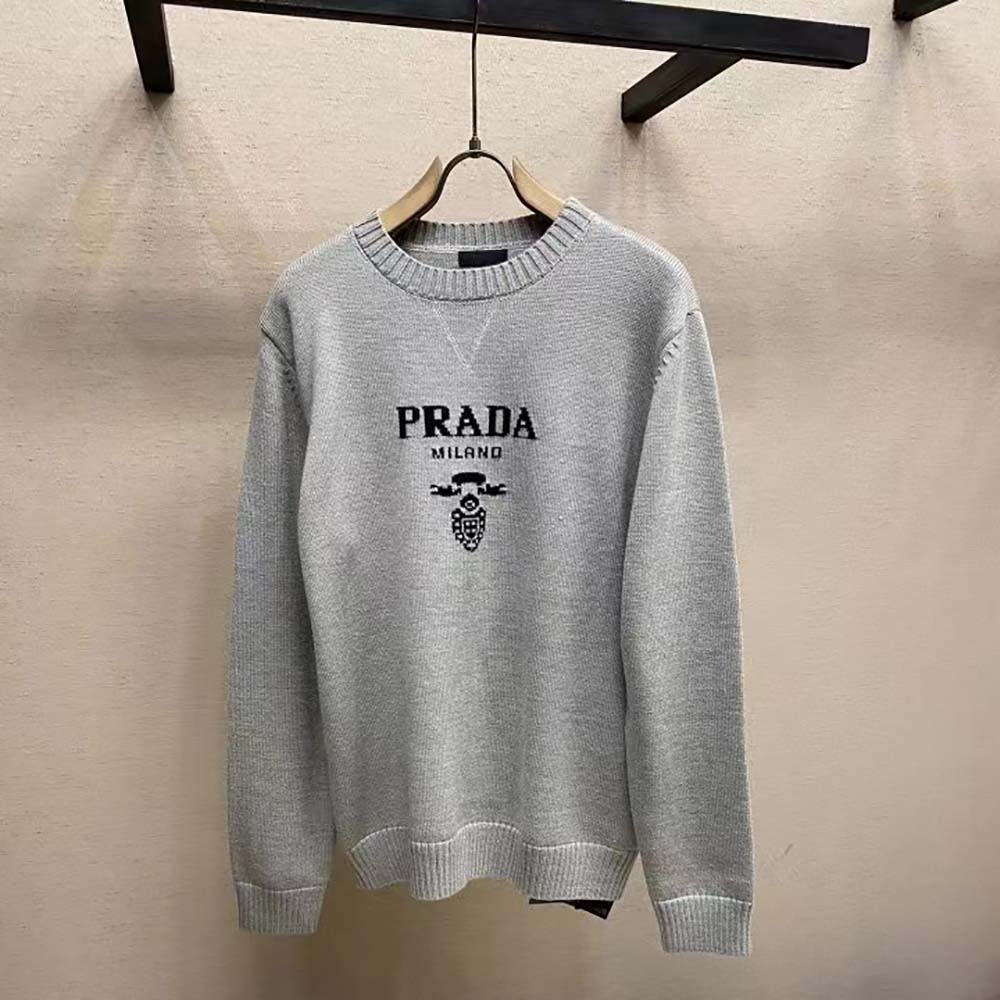 Close-up of wool-cashmere blend texture on Prada gray sweater