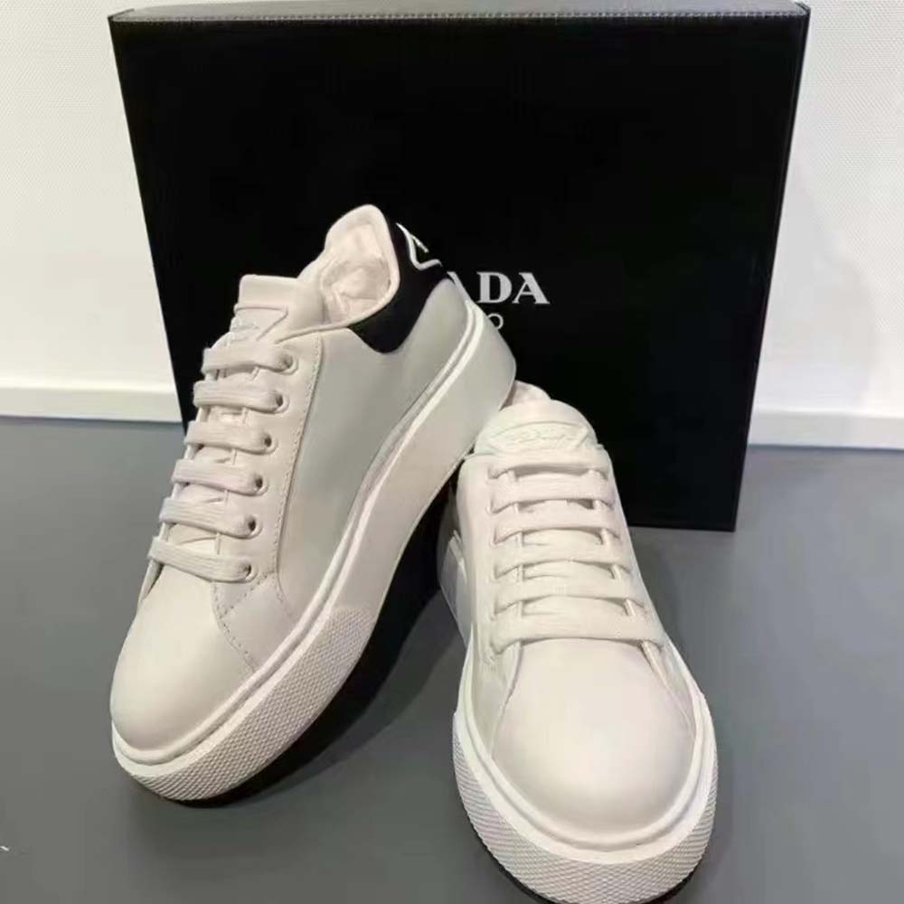 Close-up of white leather texture on Prada Unisex Macro Leather Sneakers-White