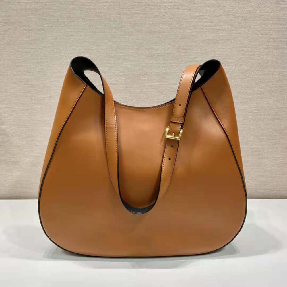 Side view showing gold-tone hardware on Prada Women Large Leather Shoulder Bag