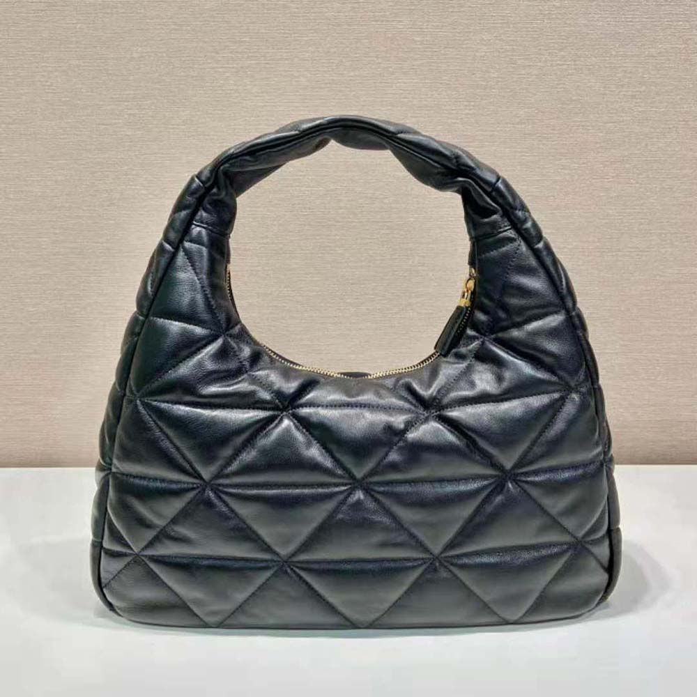 Side profile of Prada Women Large Topstitched Nappa-Leather Bag-Black highlighting structured silhouette