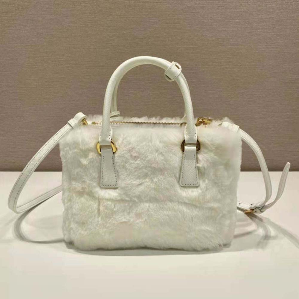 Side angle of plush shearling texture on Prada Women Prada Galleria Mini-Bag