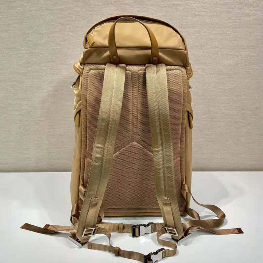 Side angle showing adjustable straps on Prada backpack