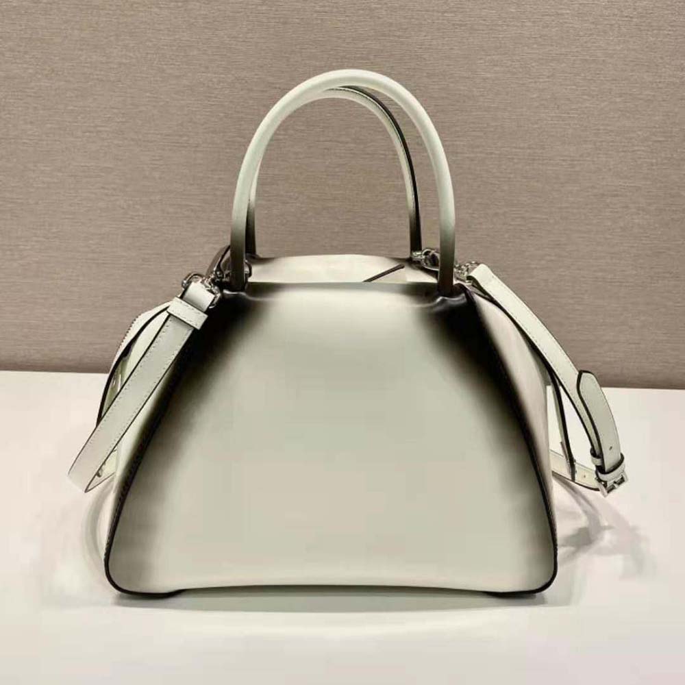 Silver-tone Prada logo hardware detail on white Prada Supernova Handbag