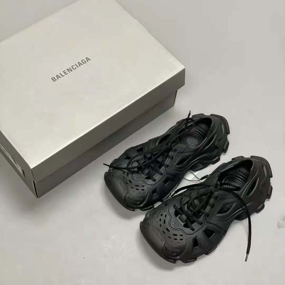 Close-up of lace and embossed logo on Balenciaga HD Sneaker