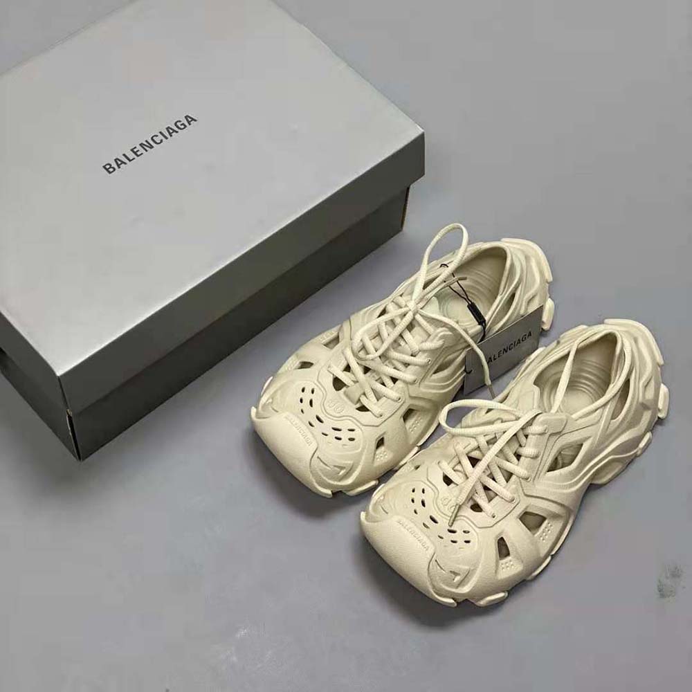 Close-up of beige leather and embossed logo on Balenciaga Unisex HD Sneaker