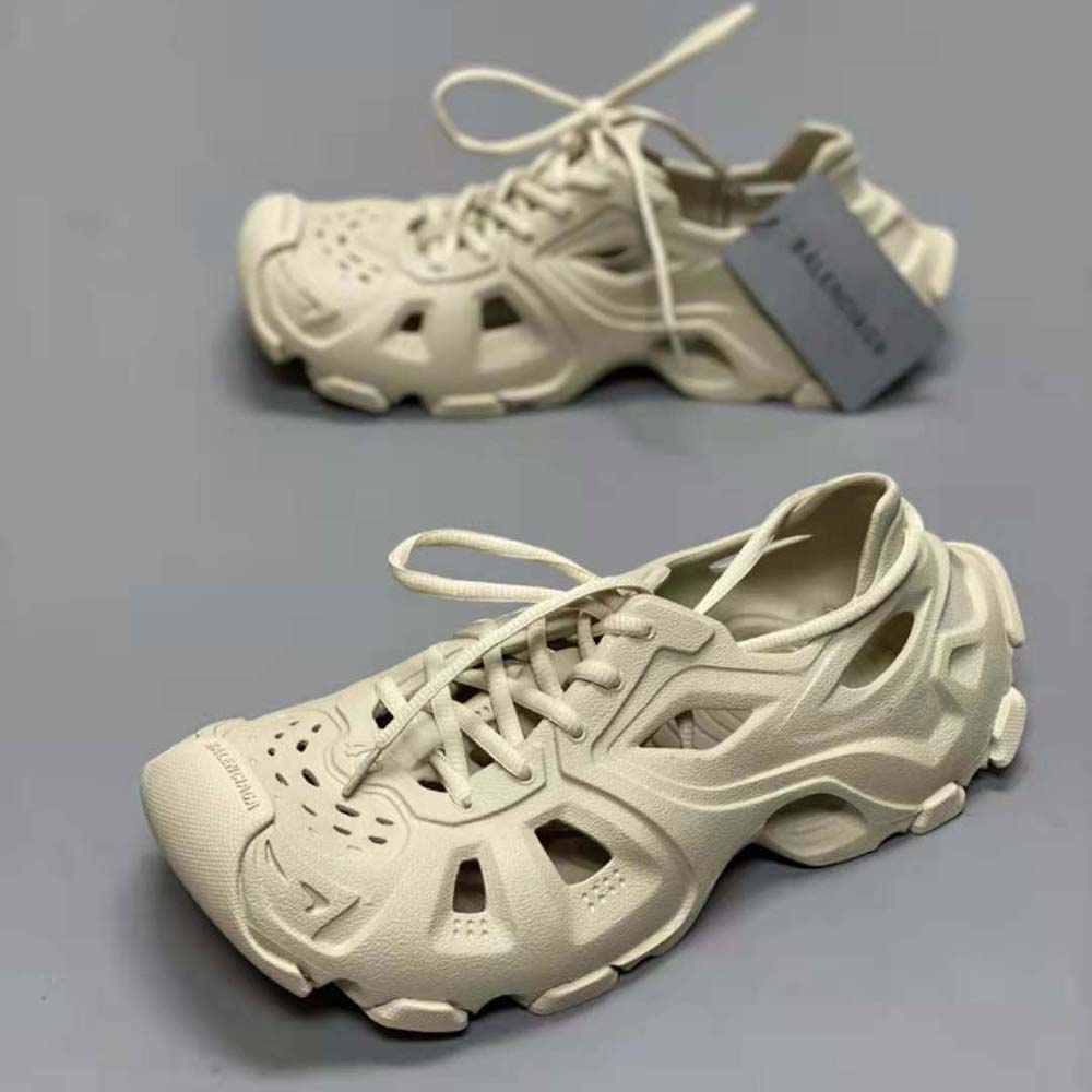 Top angle of lace-up closure and chunky sole on Balenciaga Unisex HD Sneaker